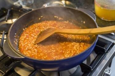 Cooking Rice in Tomato Sauce Cooking Rice in Tomato Sauce